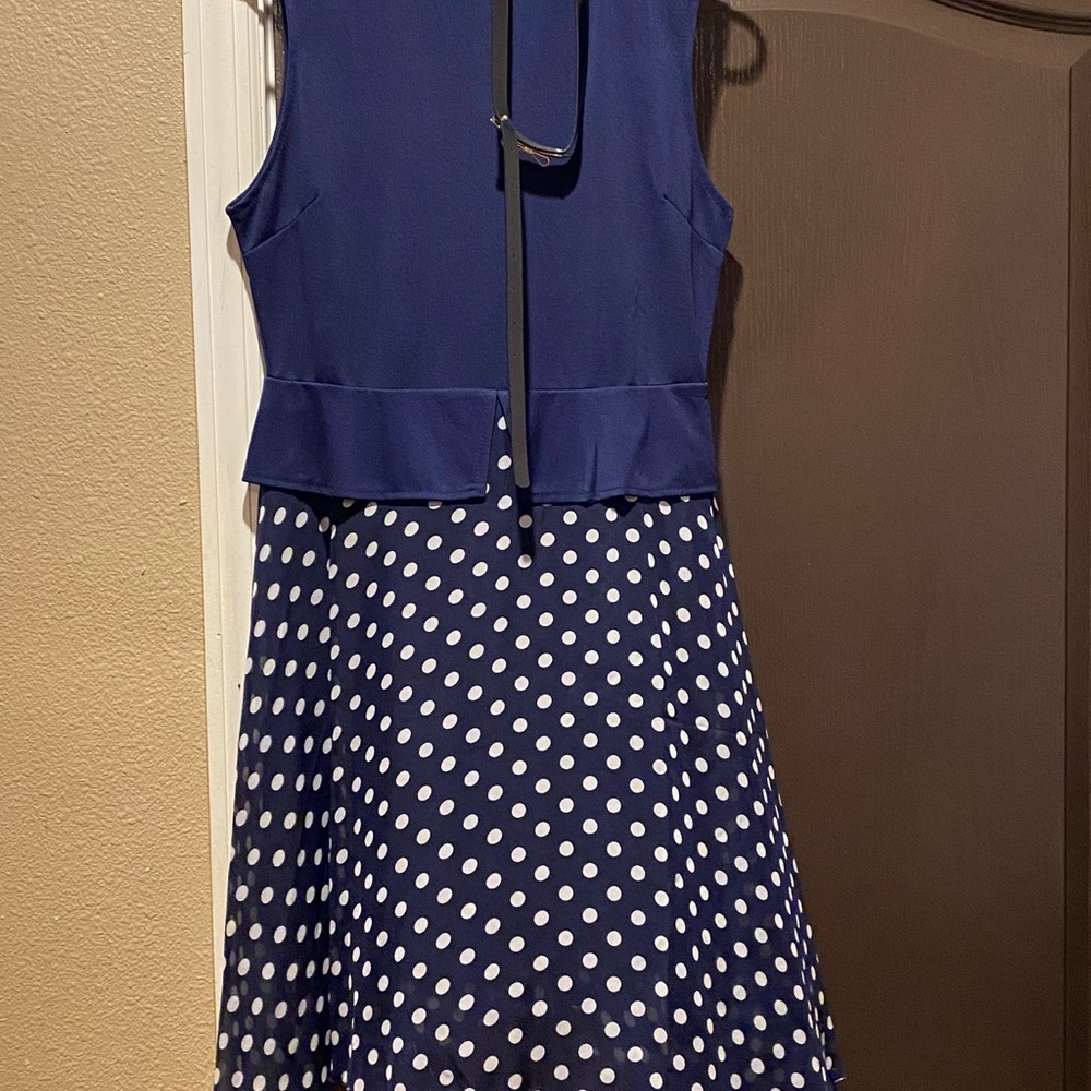 Flare dress with white poke-a-dots.